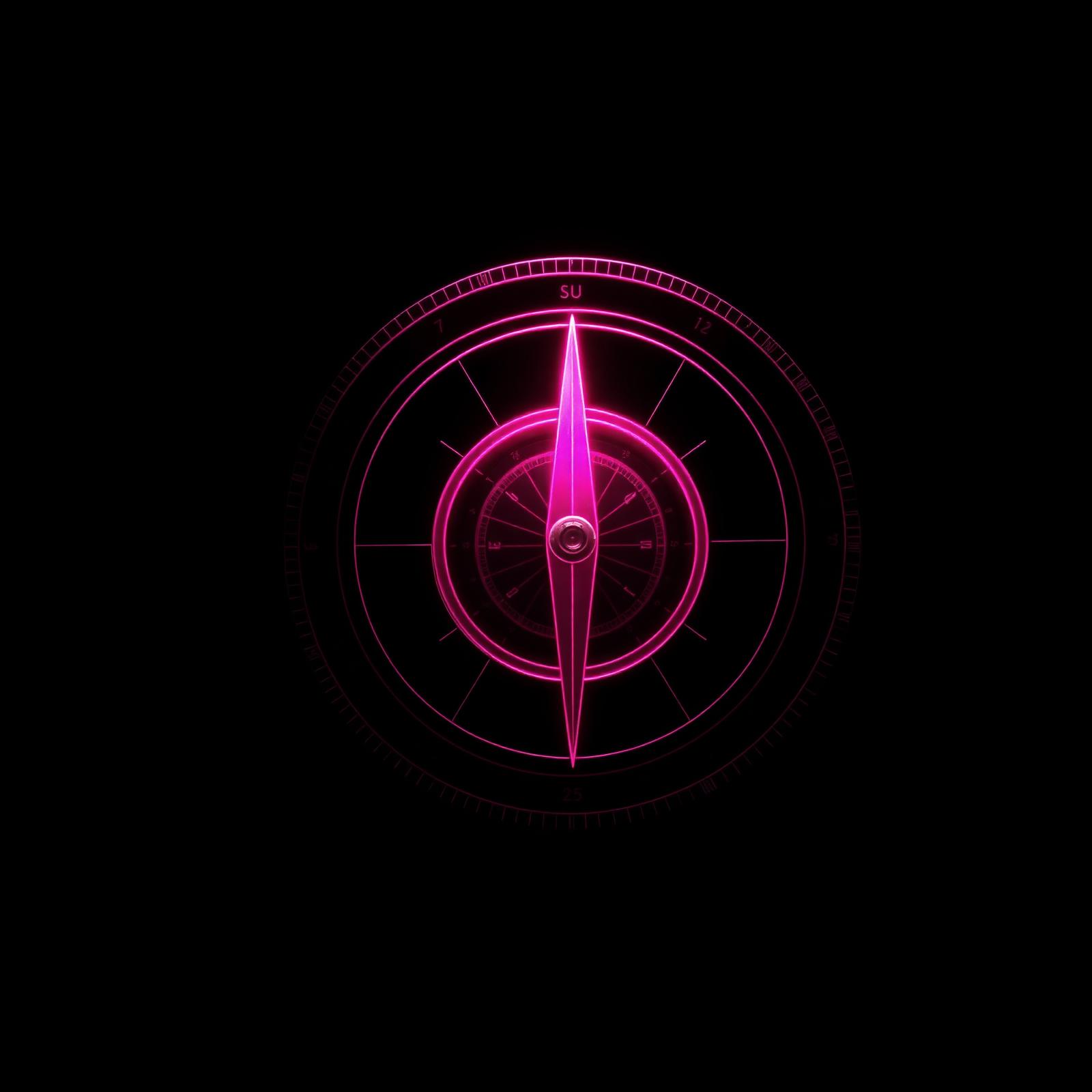 The Compass — luminous pink compass on black